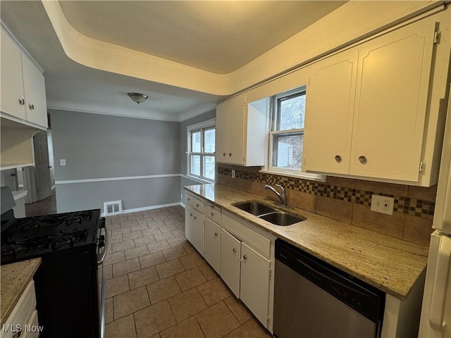 kitchen with sink, gas range, white cabinetry, dishwasher, and backsplash