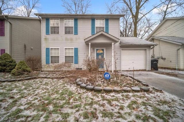 view of front of home with a garage