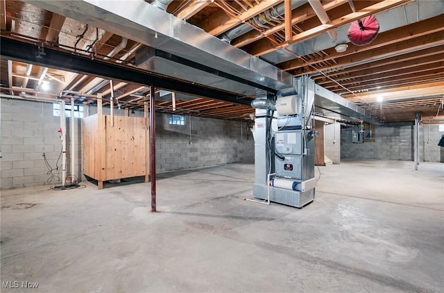 basement featuring heating unit