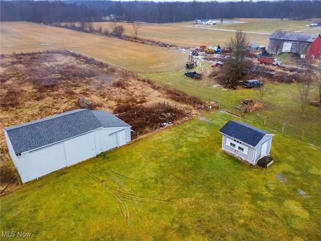 birds eye view of property featuring a rural view