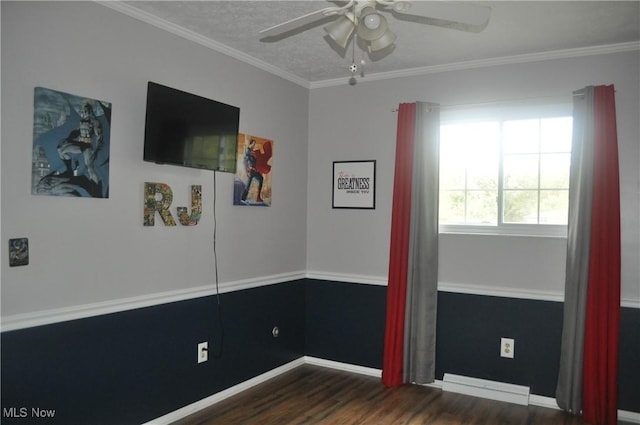 unfurnished bedroom with a textured ceiling, ornamental molding, dark hardwood / wood-style floors, and ceiling fan