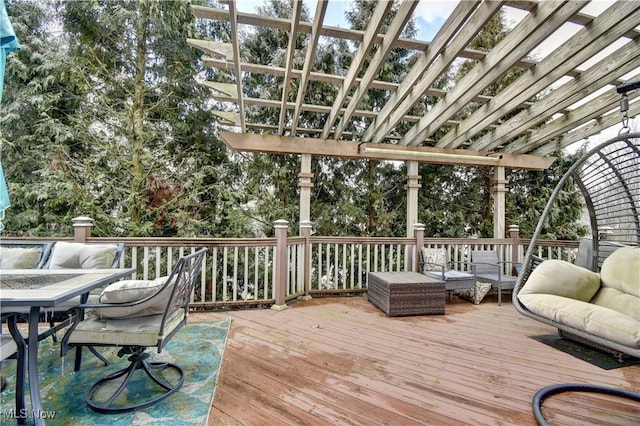 wooden terrace featuring an outdoor living space