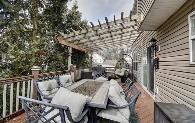 deck with a pergola and outdoor lounge area