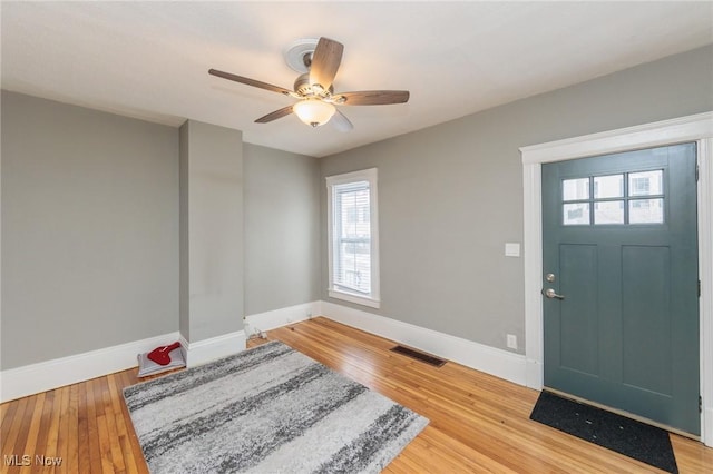 entrance foyer featuring hardwood / wood-style flooring and ceiling fan