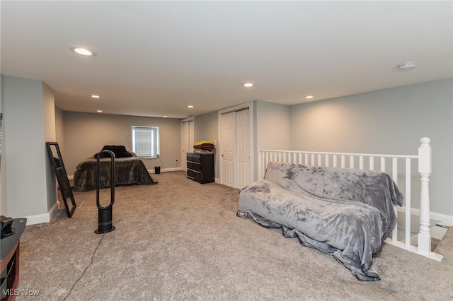 bedroom featuring carpet floors and a closet