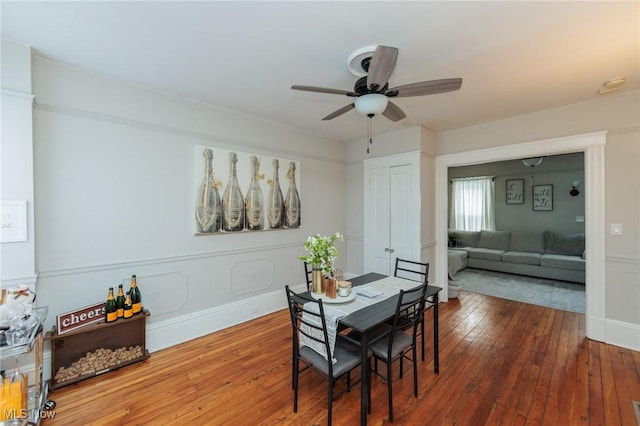 dining room featuring hardwood / wood-style floors and ceiling fan