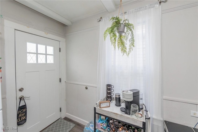 entrance foyer featuring hardwood / wood-style floors