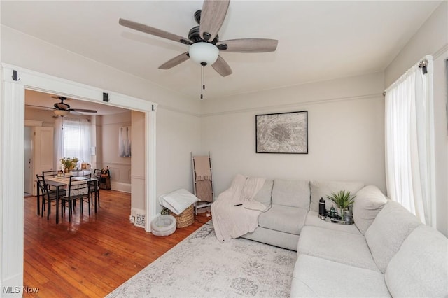 living room with hardwood / wood-style flooring and plenty of natural light