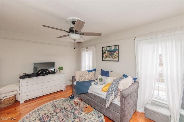 bedroom featuring ceiling fan and light hardwood / wood-style flooring