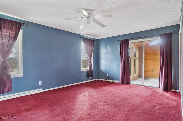 carpeted empty room featuring a textured ceiling, a baseboard radiator, and ceiling fan