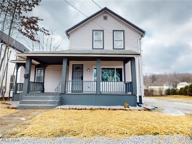 view of front of property featuring covered porch