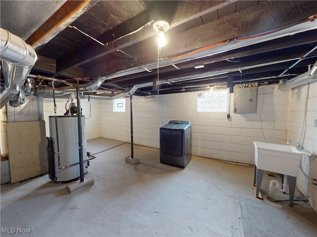 basement featuring washer / dryer, gas water heater, and electric panel