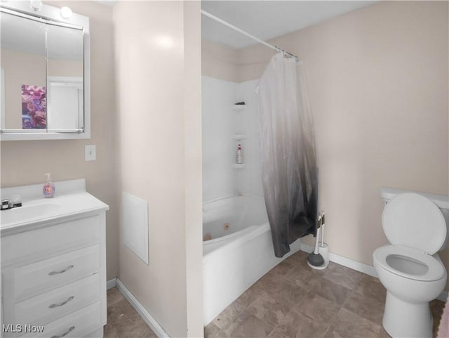 full bathroom with shower / bathtub combination with curtain, vanity, and toilet