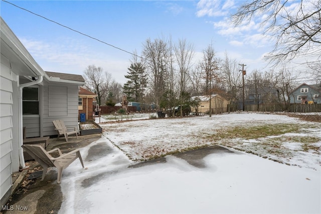 view of yard covered in snow