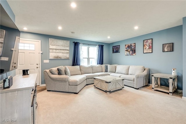 living room featuring light colored carpet