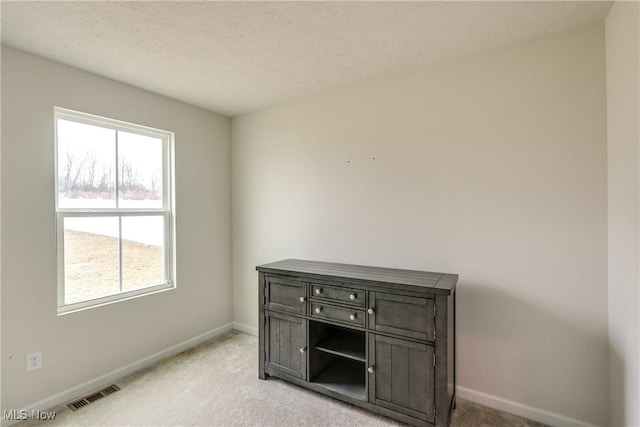 interior space with a textured ceiling