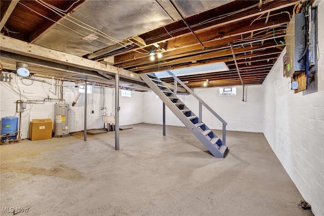 basement with sink and water heater