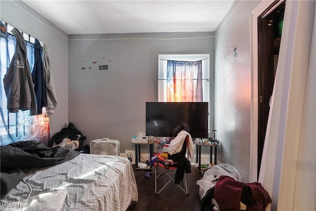 bedroom featuring hardwood / wood-style floors