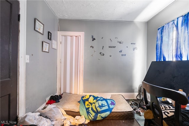 bedroom with a textured ceiling