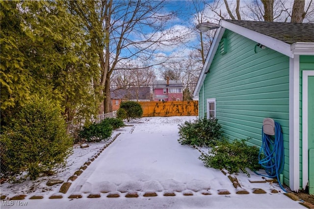 view of yard covered in snow