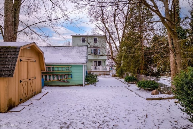 exterior space featuring a storage unit