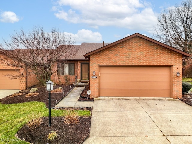 ranch-style house featuring a garage