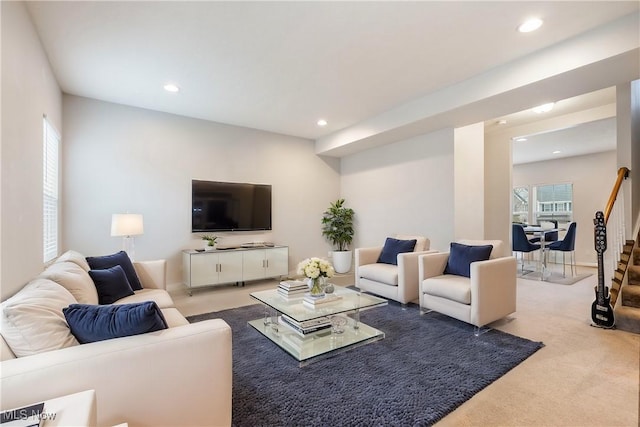 living room featuring light colored carpet