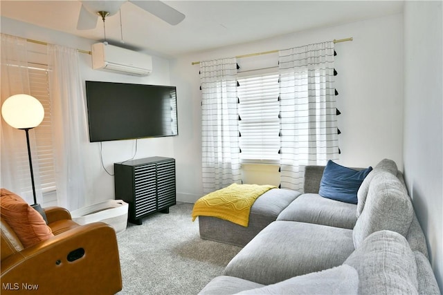 carpeted living room with ceiling fan and a wall mounted AC