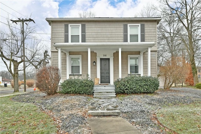 view of front property featuring a porch