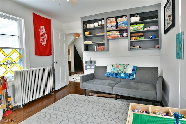 interior space featuring radiator and dark wood-type flooring