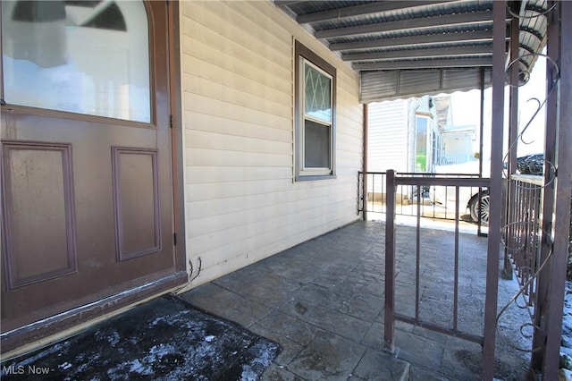 property entrance with covered porch