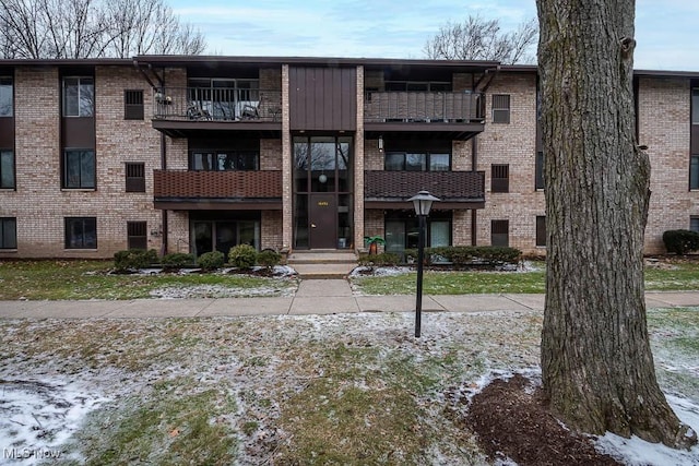 view of snow covered property