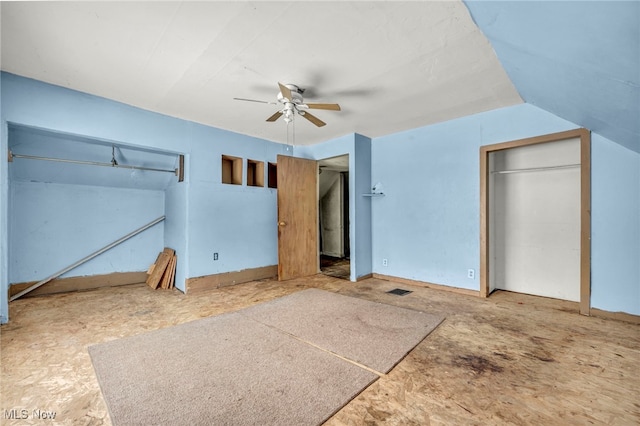 unfurnished bedroom featuring vaulted ceiling and ceiling fan