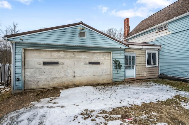 exterior space with a garage