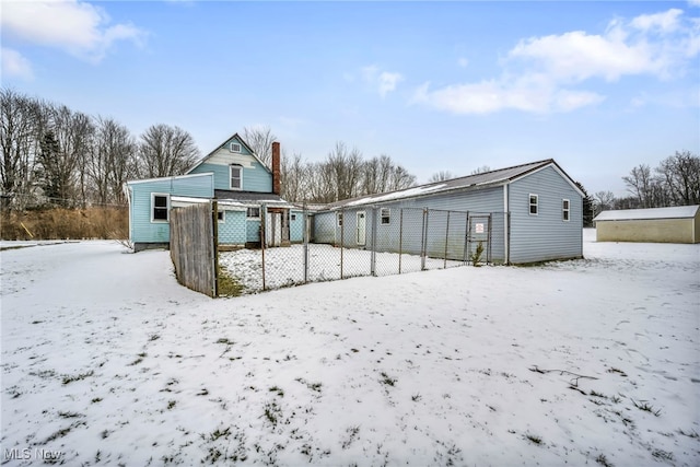 view of snow covered property