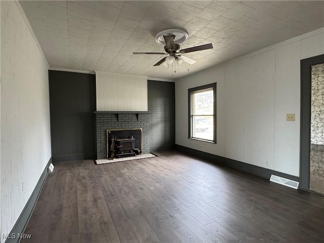 419 Saint Clair Ave, Cadiz, OH 43907 - unfurnished living room featuring ornamental molding, a ceiling fan, wood finished floors, and a fireplace