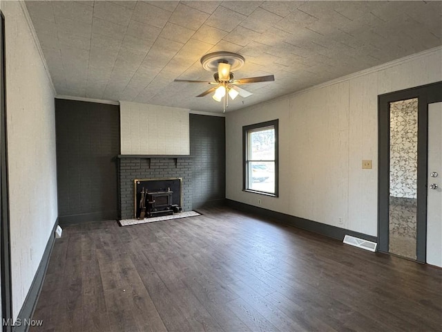 419 Saint Clair Ave, Cadiz, OH 43907 - unfurnished living room featuring ornamental molding, ceiling fan, dark wood finished floors, and baseboards