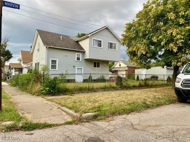 view of front facade with a front yard