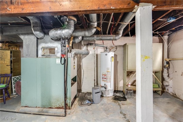 utility room featuring gas water heater