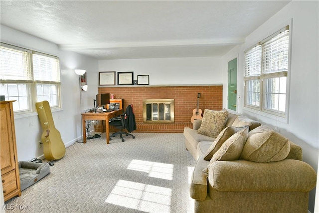 carpeted office space featuring a fireplace