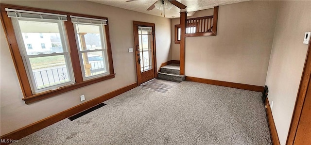 1151 Bedford Ave SW, Canton, OH 44710 - empty room with visible vents, ceiling fan, and carpet floors