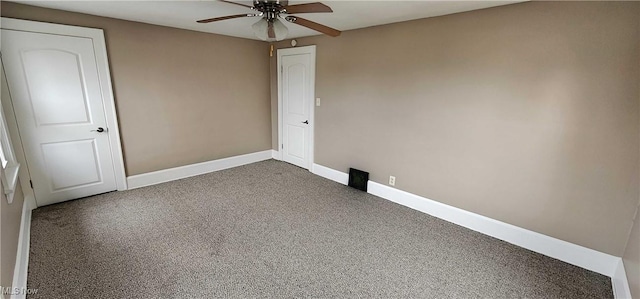 1151 Bedford Ave SW, Canton, OH 44710 - carpeted empty room featuring a ceiling fan and baseboards