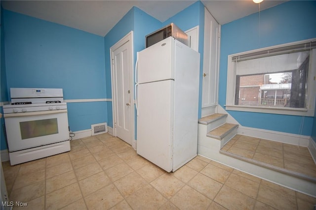 kitchen featuring white appliances