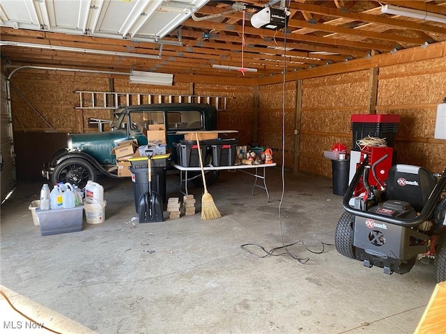 garage featuring a garage door opener