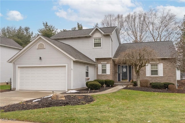 view of front property featuring a garage and a front lawn