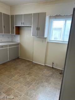 kitchen featuring gray cabinetry