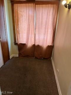 unfurnished bedroom featuring carpet