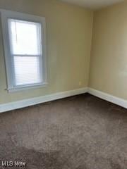 view of carpeted spare room