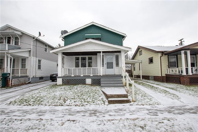 bungalow-style home featuring covered porch