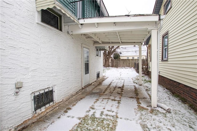 view of snow covered patio